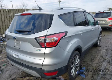 2018 Ford Escape Titanium из США, поврежденный, VIN 1FMCU9J90JUC73822